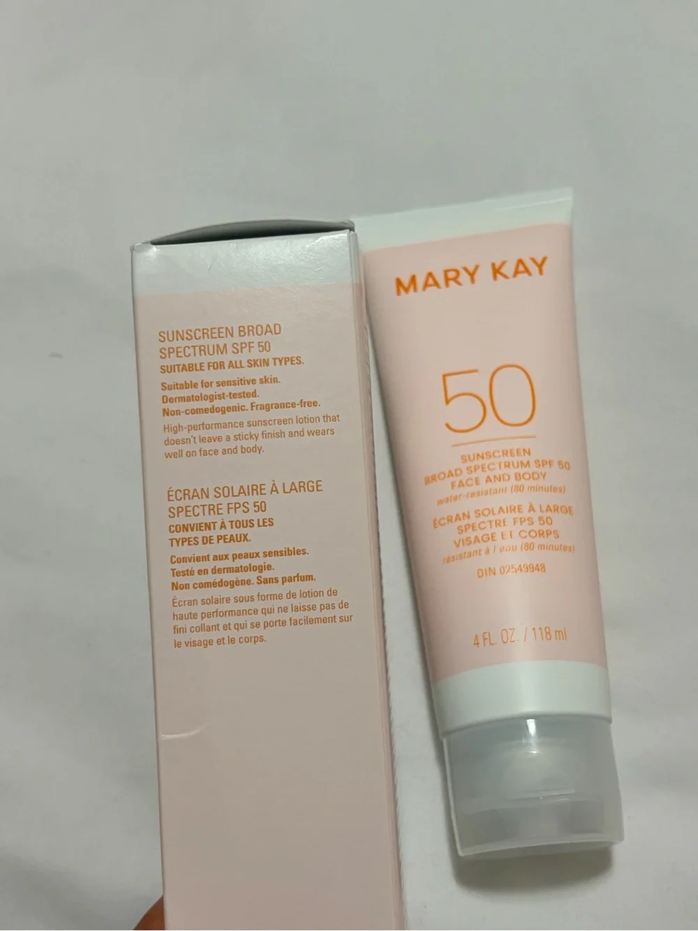 Mary Kay SPF 50 Broad Spectrum Sunscreen Tube and Box - Soft Pink with Gold Text
